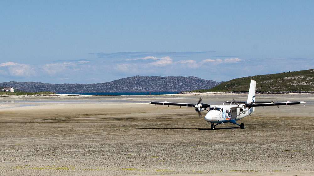 Flugzeug auf dem Strand