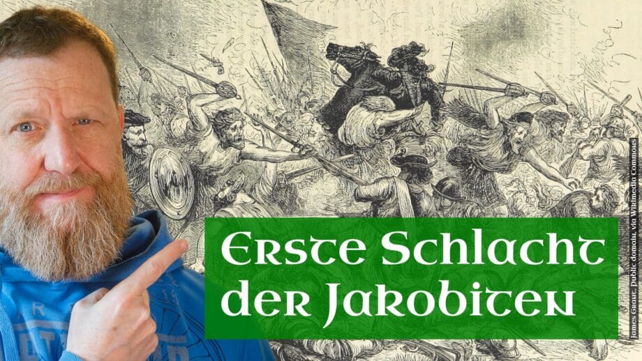 Ein Mann zeigt auf eine alte Darstellung einer Schlacht in schwarzweiß.